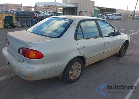 2001 Toyota Corolla Le z USA, uszkodzony, nr VIN 1NXBR12E21Z450378